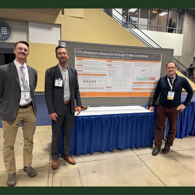 Cameron Bennett, Chris Cherry, and John MacArthur present a poster at TRB 2025