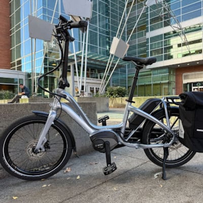 An e-bike parked in front of the PSU engineering building